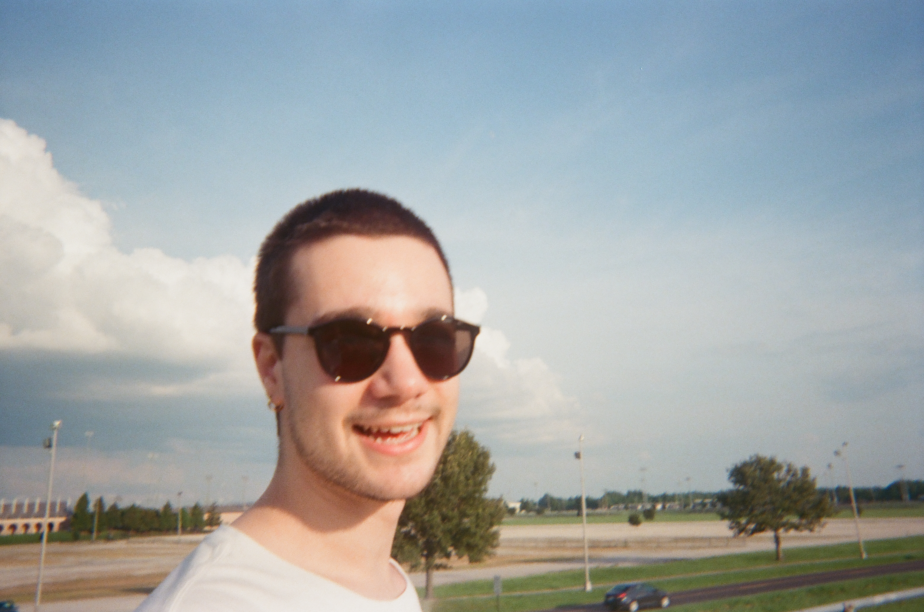 Will Decker outdoors beneath a blue sky
